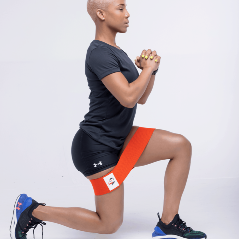 Woman exercising with resistance bands on a white background