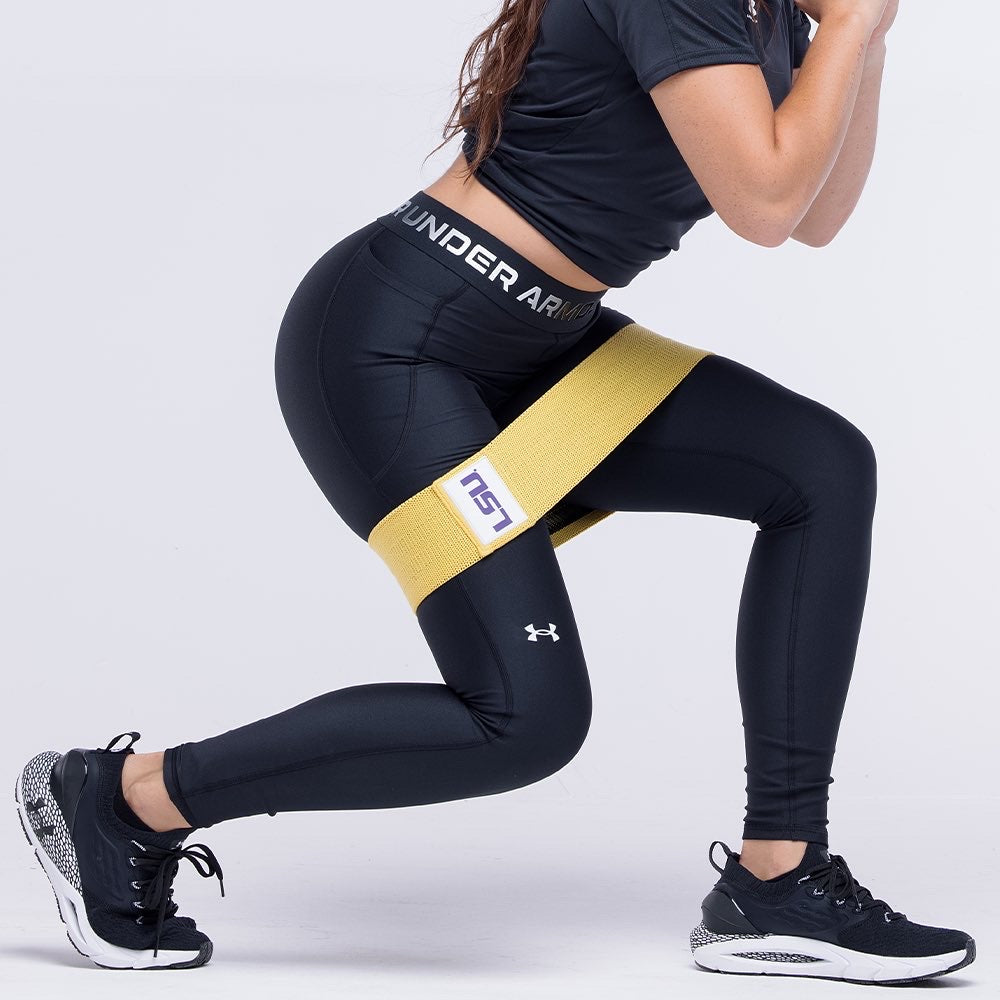 Person exercise with a yellow band